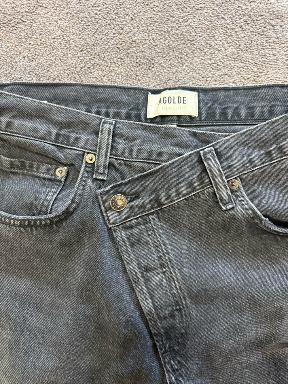 AGOLDE asymmetrical black wash Denim Jeans